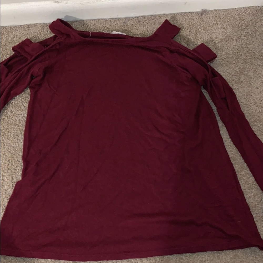 a maroon , soft, long sleeve shirt
